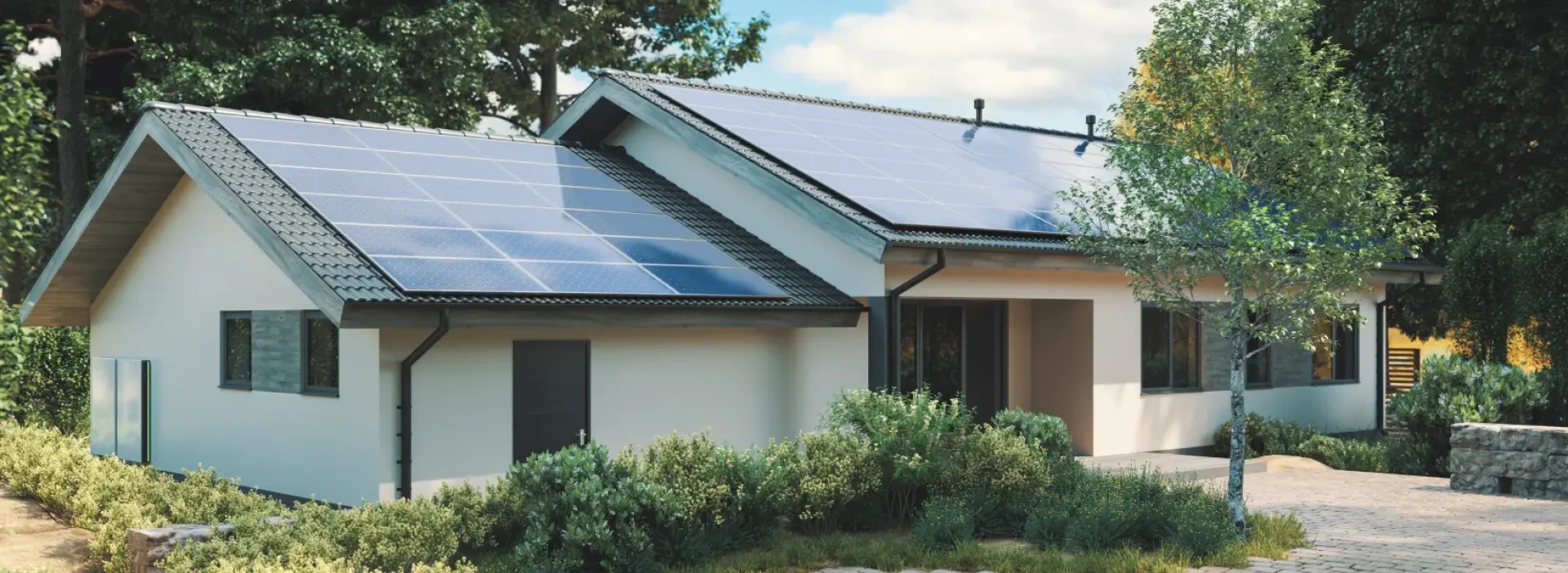 Stylish modern home with many solar panels, in a beautiful calm setting with trees.